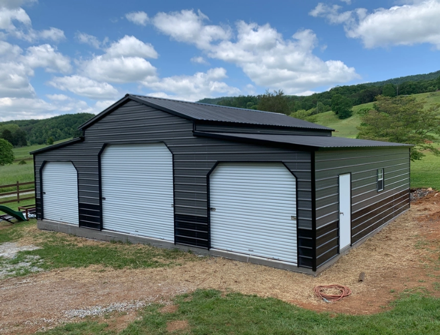 Red metal barn with horses and tractor